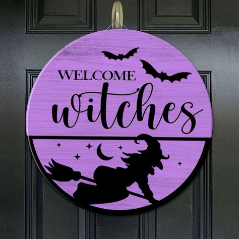 The witch is in door hanger